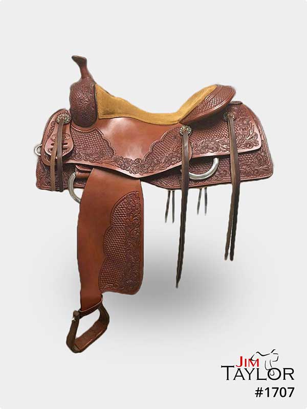 Brown cow horse western saddle