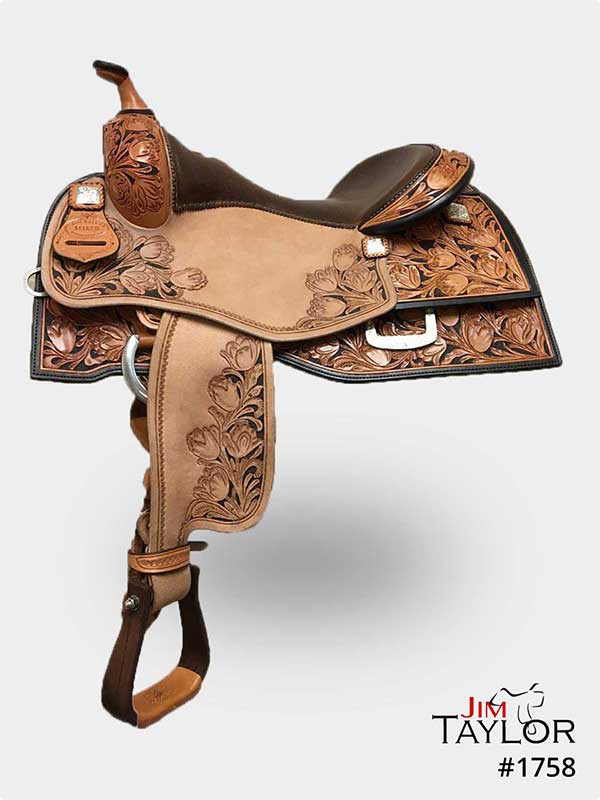 Light brown western saddle with tooling